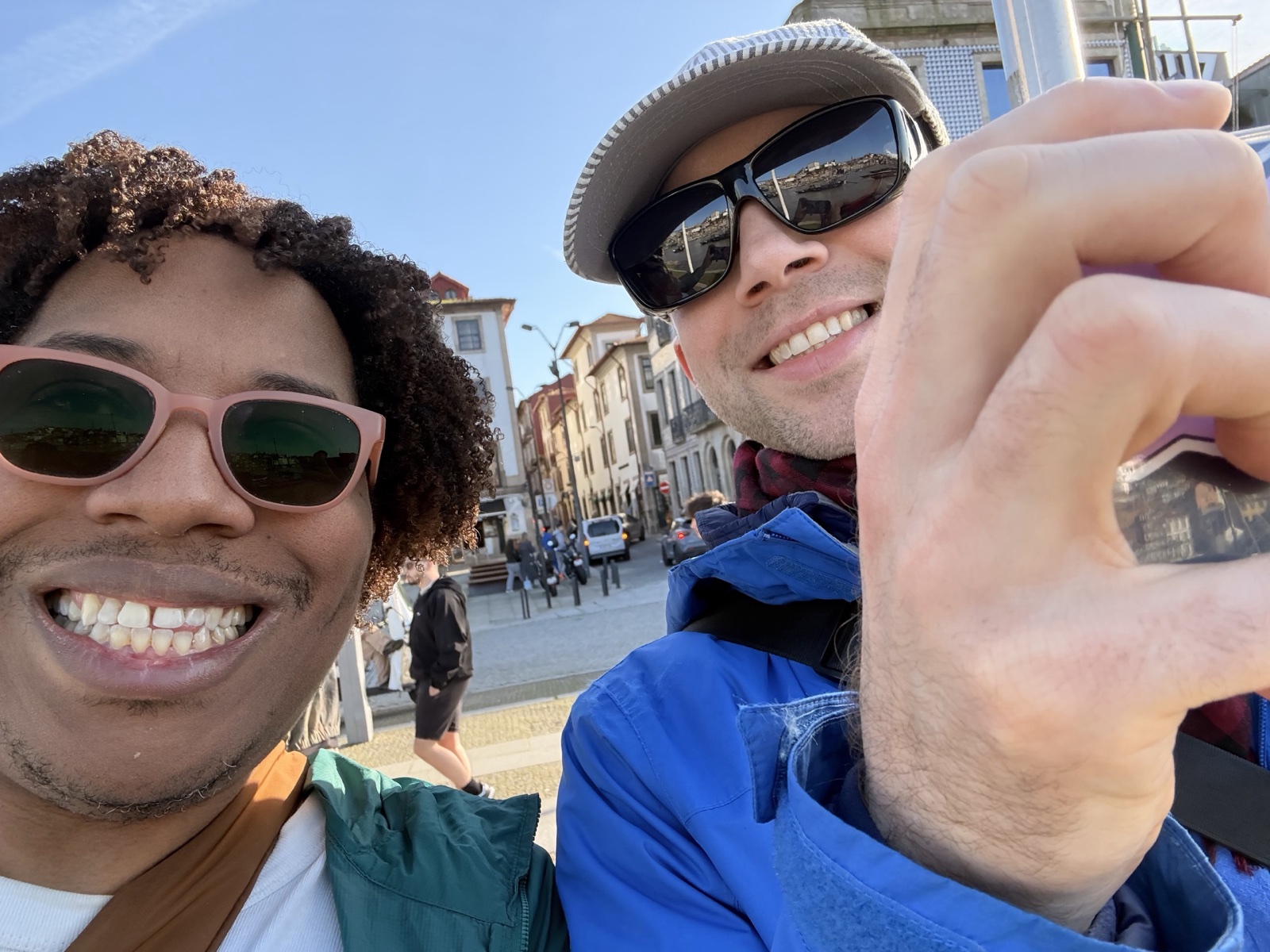 Two people smiling together outdoors